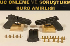 Buca'da bir çöpte 2 ruhsatsız tabanca ve 19 mermi ele geçirildi