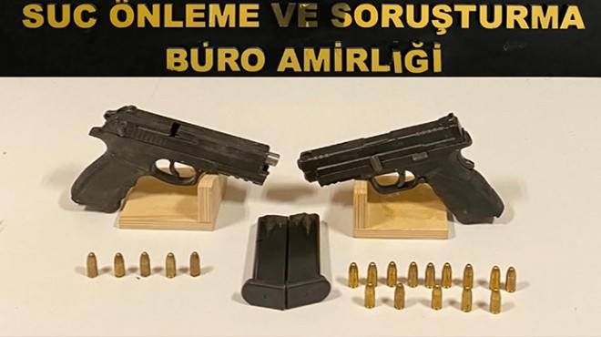 Buca’da bir çöpte 2 ruhsatsız tabanca ve 19 mermi ele geçirildi