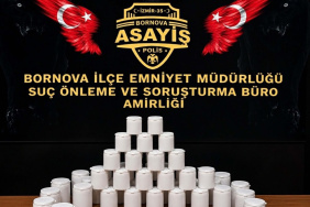 Bornova'da bir evde yapılan operasyonda 2 bin 775 sentetik hap ele geçirildi