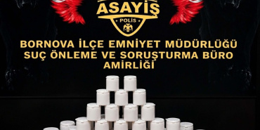 Bornova'da bir evde yapılan operasyonda 2 bin 775 sentetik hap ele geçirildi